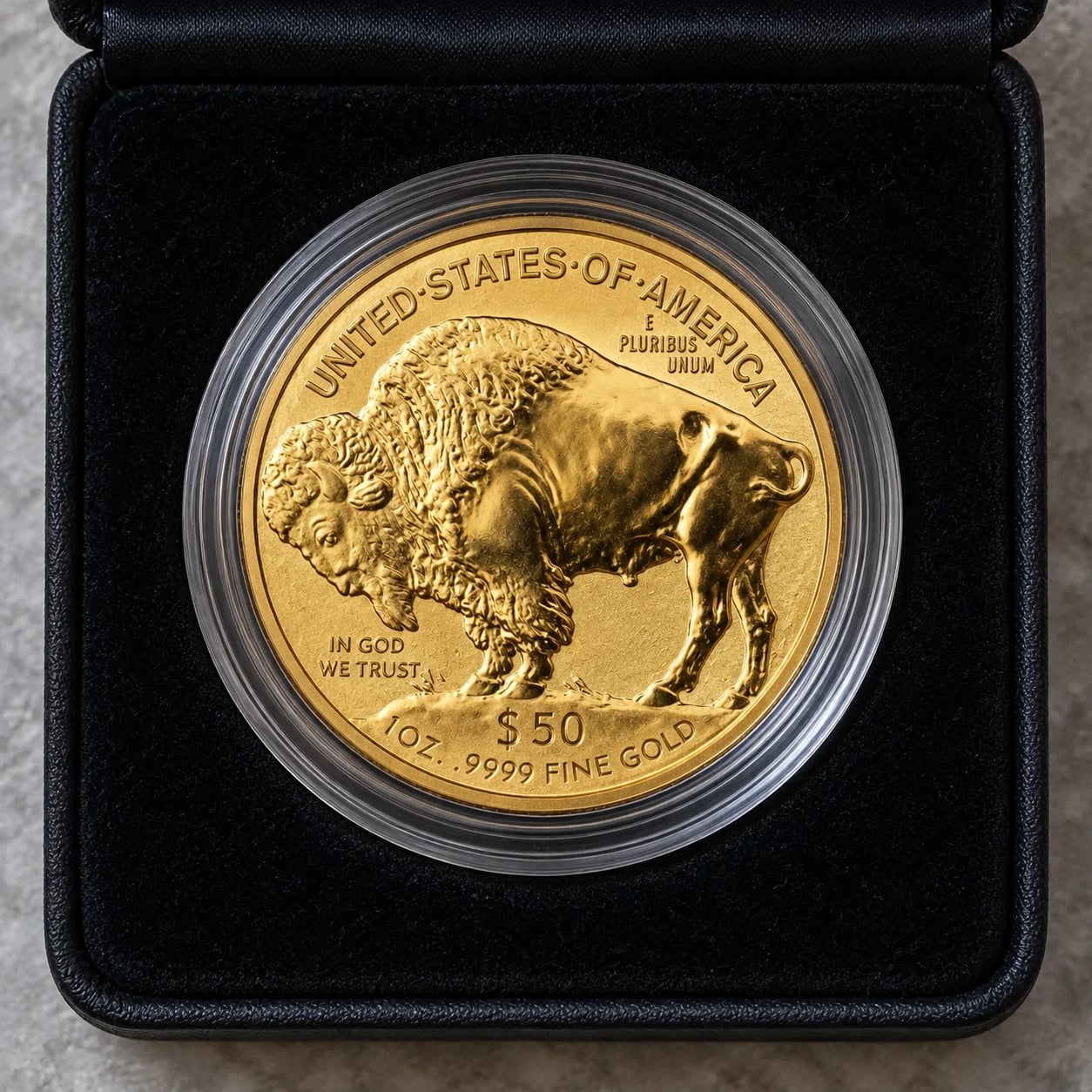 A complete 2013 one-ounce American Gold Buffalo reverse proof coin showing the bison in a presentation case