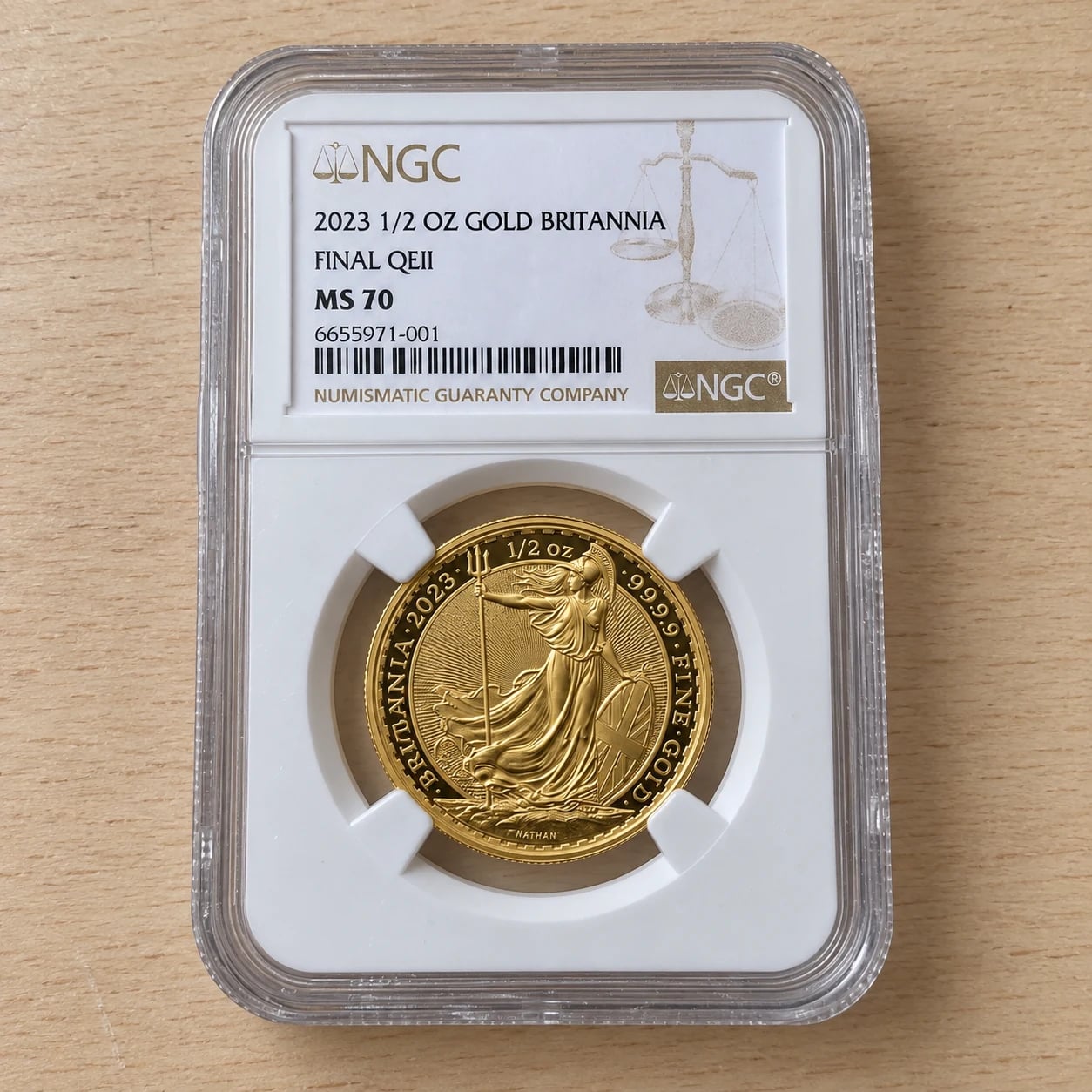 A complete 2023 half-ounce Gold Britannia coin in an NGC MS70 holder