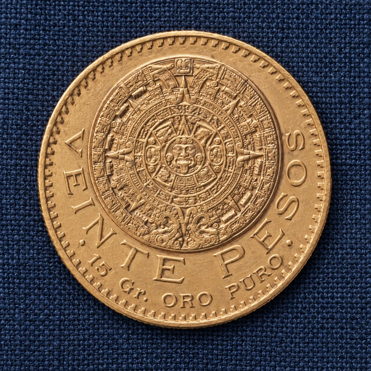 A complete Mexican 20 Pesos Azteca gold coin showing the Aztec Calendar design