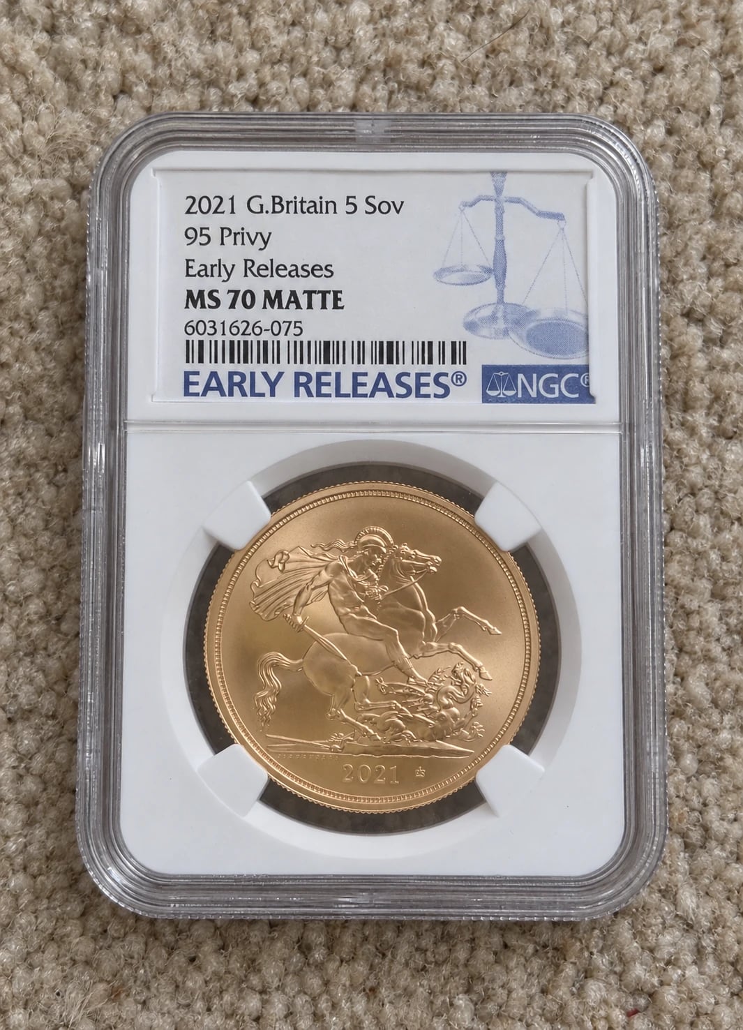 A 2021 Five-Sovereign Piece coin in an NGC graded holder