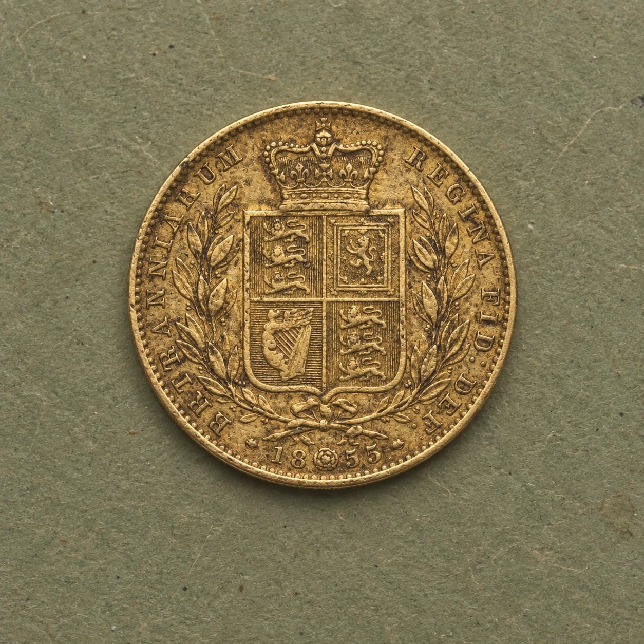The shield reverse of an 1855 Victoria Gold Sovereign coin